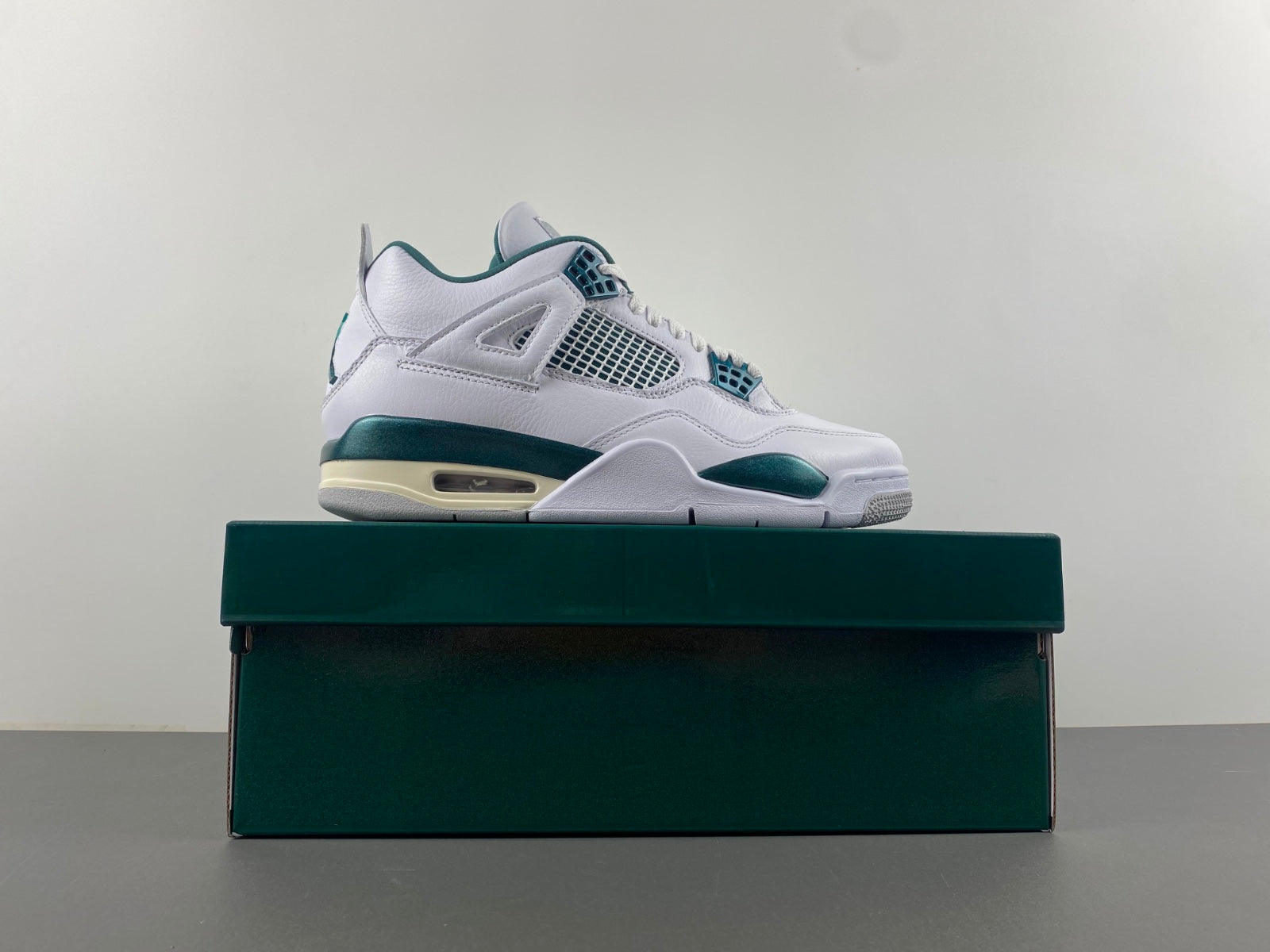 Air Jordan 4 Retro Oxidized Green